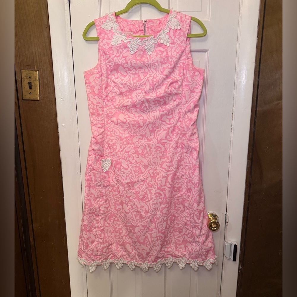 The Lilly 1960s Lilly Pulitzer pink dress with panda and bows & white trim